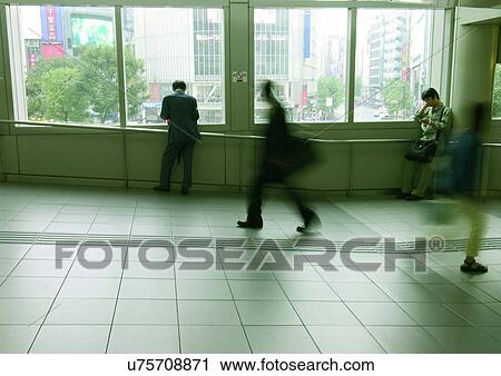 Stock Image - Walking, Group Of People, Indoor. Fotosearch