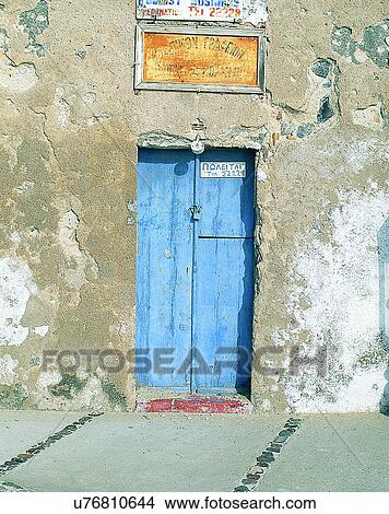 Picture - building, Europe, doors, walls, blue, signs. Fotosearch
