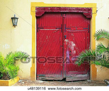 Stock Photograph - building, Europe, doors, walls, red, wood. Fotosearch