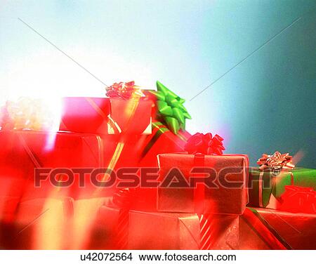 Picture - Christmas, indoors, gifts, presents, bows, ribbons. Fotosearch