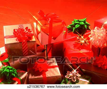 Christmas, indoors, gifts, presents, bows, ribbons View Large Photo Image Stock Photo - Christmas, indoors, gifts, presents, bows, ribbons. Fotosearch