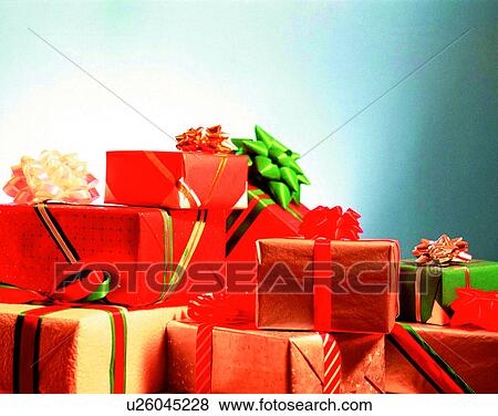 Christmas, indoors, gifts, presents, bows, ribbons View Large Photo Image Stock Photo - Christmas, indoors, gifts, presents, bows, ribbons. Fotosearch