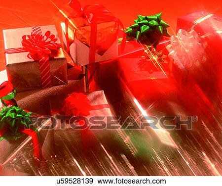 Stock Photo - Christmas, indoors, gifts, presents, bows, ribbons. Fotosearch