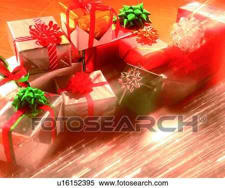 Christmas, indoors, gifts, presents, bows, ribbons View Large Photo Image Stock Photography - Christmas, indoors, gifts, presents, bows, ribbons. Fotosearch