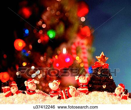Stock Photograph - Christmas, indoors, santa claus, miniature, tree, star. Fotosearch