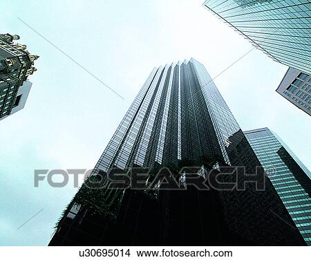 Picture - City view, modern look, outdoors, low angel view, sky, clouds. Fotosearch