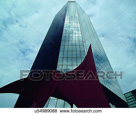 Stock Photo - City view, modern look, outdoors, low angel view, sunshine, sky. Fotosearch