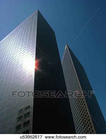 Stock Photo - City view, modern look, outdoors, sky, windows, building. Fotosearch