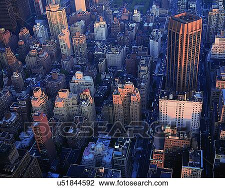 Stock Image - City view, modern look, outdoors, windows, building, business. Fotosearch
