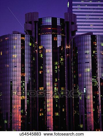 Stock Image - City view, modern look, outdoors, windows, building, business. Fotosearch