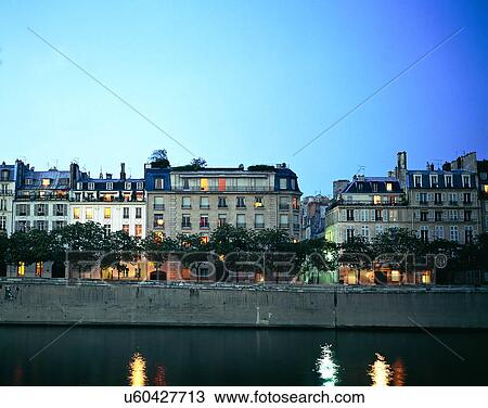 Stock Image - City view, modern look, outdoors, buildings, trees, day time. Fotosearch