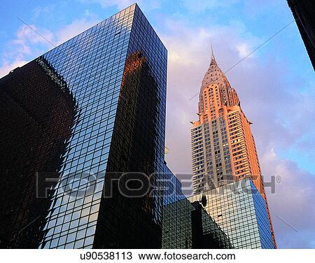 Stock Image - City view, modern look, outdoors, windows, building, business. Fotosearch