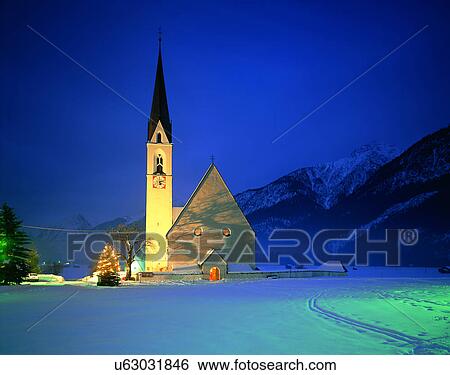 Stock Photograph - City view, outdoors, buildings, night time, lights, sky. Fotosearch