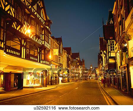 Stock Photograph - City view, outdoors, night time, lights, sky, evening. Fotosearch