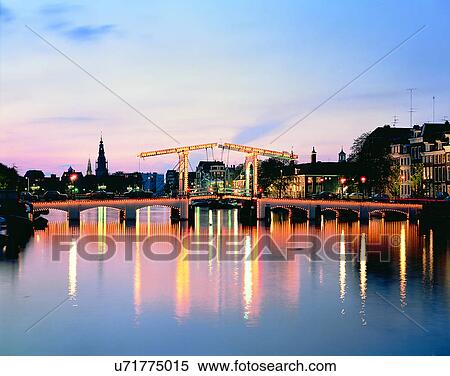 Stock Photography - City view, outdoors, night time, lights, sky, water front. Fotosearch