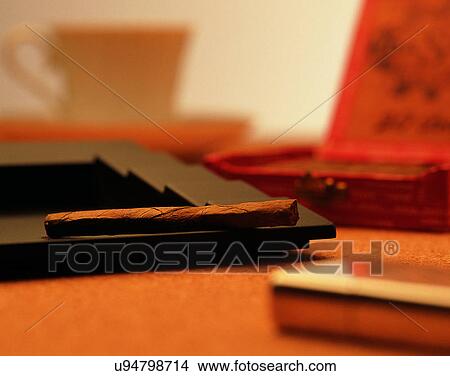 close-up, background, cup, cigar, soft light View Large Photo Image Picture - close-up, background, cup, cigar, soft light. Fotosearch