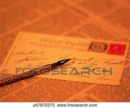Stock Image - close-up, background, pen, post card, paper, newspaper. Fotosearch