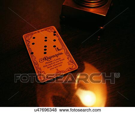 Stock Photo - close-up, background, plastic key, hotel key, light, soft light. Fotosearch