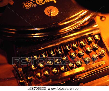 Stock Image - close-up, background, typewriter, push button, letters, antique. Fotosearch