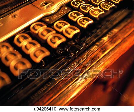 Stock Image - close-up, background, typewriter, push button, letters, antique. Fotosearch