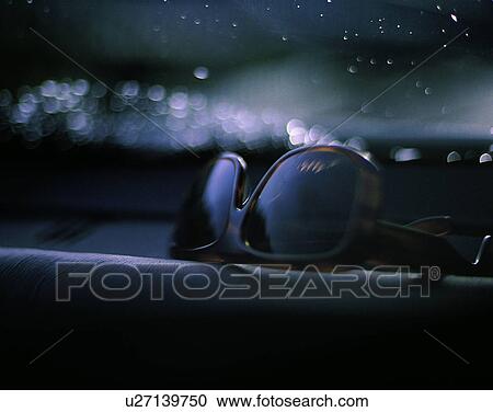 Stock Image - close-up, indoor, detail, background, sun glasses, rain drop. Fotosearch
