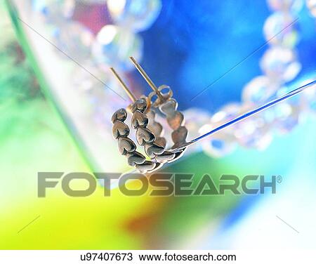 close-up, jewelry, luxury, crystal, gold, ear ring View Large Photo Image Stock Image - close-up, jewelry, luxury, crystal, gold, ear ring. Fotosearch