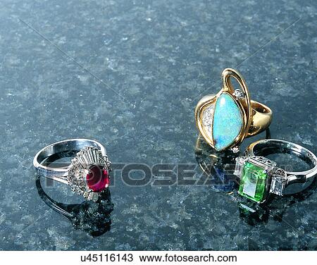 Stock Image - close-up, jewelry, luxury, rings, gold, gems. Fotosearch