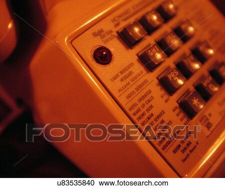 Stock Image - close-up, soft light, defocused, indoor, telephone, hotel phone. Fotosearch