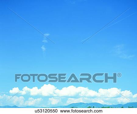 Stock Image - clouds, sky, outdoors, daytime, bright, sunlight. Fotosearch
