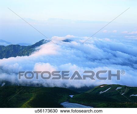 Stock Image - clouds, sky, outdoors, daytime, mountains, landscape. Fotosearch