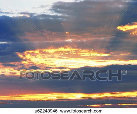 clouds, sky, outdoors, sunrise, rays View Large Photo Image Stock Photograph - clouds, sky, outdoors, sunrise, rays. Fotosearch