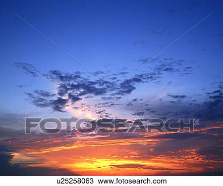 Stock Image - clouds, sky, outdoors, sunset. Fotosearch