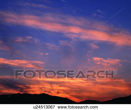 clouds, sky, outdoors, sunset, mountains, landscape View Large Photo Image Stock Photo - clouds, sky, outdoors, sunset, mountains, landscape. Fotosearch