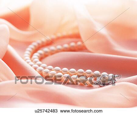Stock Image - Color images, close-up, jewelry, luxury, necklace, pearls. Fotosearch