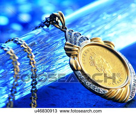 Stock Image - Color images, close-up, jewelry, luxury, necklace, gold. Fotosearch