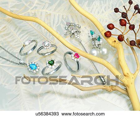 Stock Image - Color images, close-up, jewelry, luxury, rings, pins, diamonds. Fotosearch