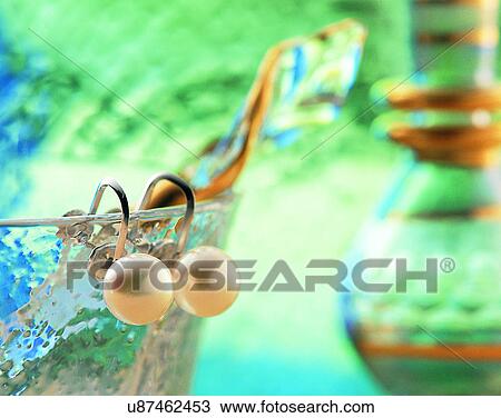 Color images, close-up, jewelry, luxury, earrings, pearls, glass View Large Photo Image Stock Image - Color images, close-up, jewelry, luxury, earrings, pearls, glass. Fotosearch