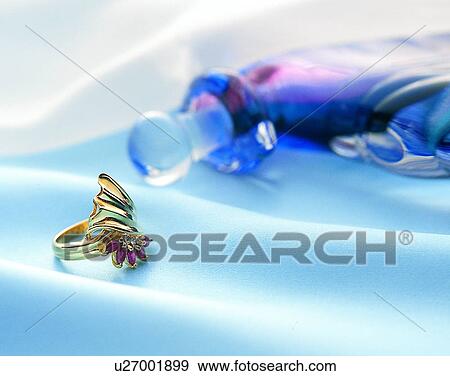 Stock Photo - Color images, close-up, jewelry, luxury, stone, ring, gold. Fotosearch