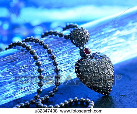 Color images, close-up, jewelry, luxury, necklace, heart, gem View Large Photo Image Stock Photo - Color images, close-up, jewelry, luxury, necklace, heart, gem. Fotosearch