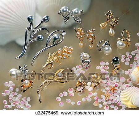 Stock Photo - Color images, close-up, jewelry, luxury, earrings, pins, pearls. Fotosearch