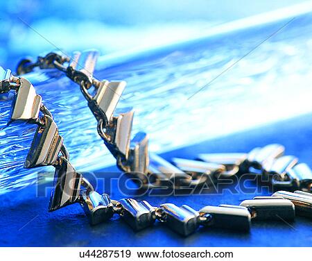 Color images, close-up, jewelry, luxury, necklace, silver, glass View Large Photo Image Stock Photo - Color images, close-up, jewelry, luxury, necklace, silver, glass. Fotosearch