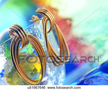 Color images, close-up, jewelry, luxury, earrings, gold, glass View Large Photo Image Stock Photograph - Color images, close-up, jewelry, luxury, earrings, gold, glass. Fotosearch