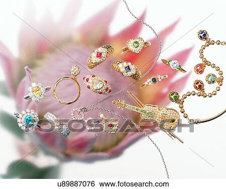 Stock Photograph - Color images, close-up, jewelry, luxury, rings, pins, diamonds. Fotosearch