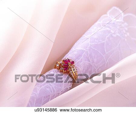 Stock Photograph - Color images, close-up, jewelry, luxury, ring, gems, stone. Fotosearch
