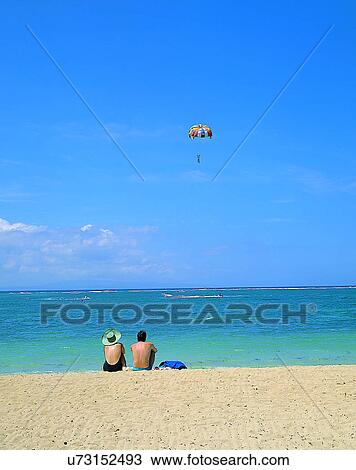 companionship, beach, parachute, sitting, back, faraway View Large Photo Image Stock Image - companionship, beach, parachute, sitting, back, faraway. Fotosearch