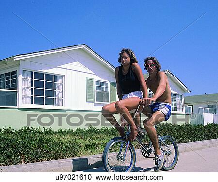 Stock Image - couples, companionship, friends, young, outdoors. Fotosearch