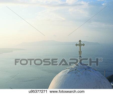 Stock Image - cross, outdoors, dome, church, rooftop, Aegean sea. Fotosearch
