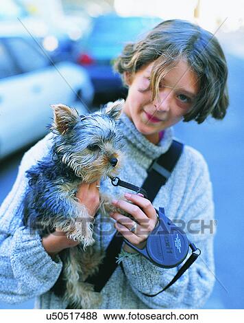 dog, outdoors, carried, held, child, leash View Large Photo Image Stock Photo - dog, outdoors, carried, held, child, leash. Fotosearch