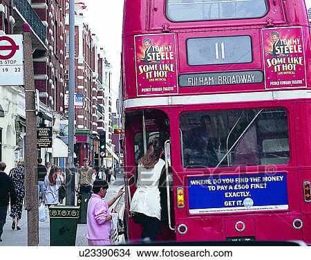 Picture - England, UK, Europe, outdoors, buildings, bus stop. Fotosearch