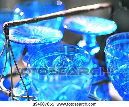 Stock Photography - Europe, close-up, drinking ware, glasses, rack, blue. Fotosearch